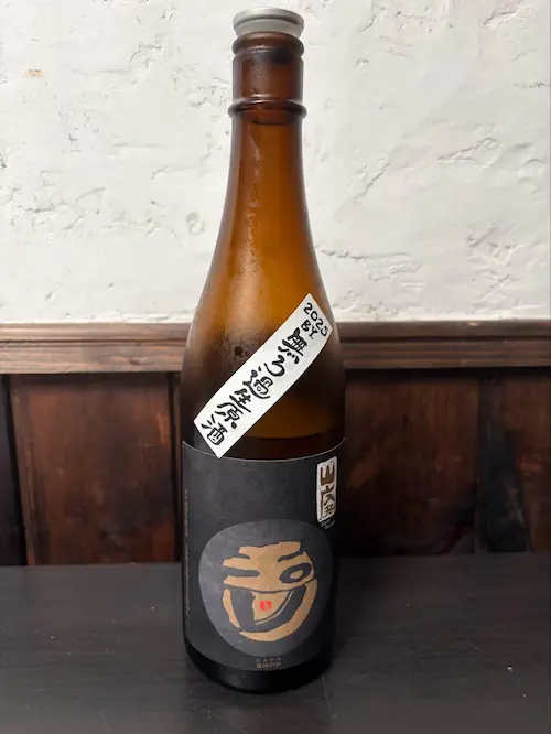 A bottle of Tamagawa Yamahai Junmai Muroka Namagenshu