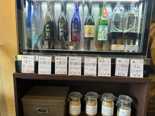 Self-service tasting machine with more than 20 types of sake gin and rum at Matsui Sake Brewery Kyoto